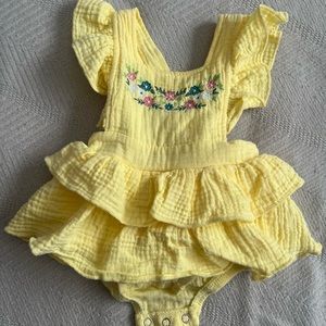 Baby romper with floral designs,size 0-3 and only worn once. In great condition!